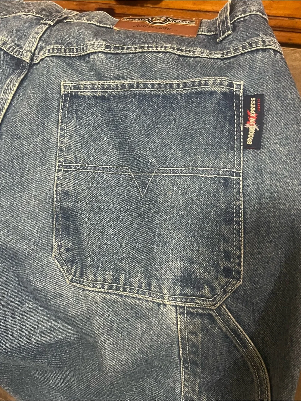 Men's Distressed Blue Jeans with Patch Detail